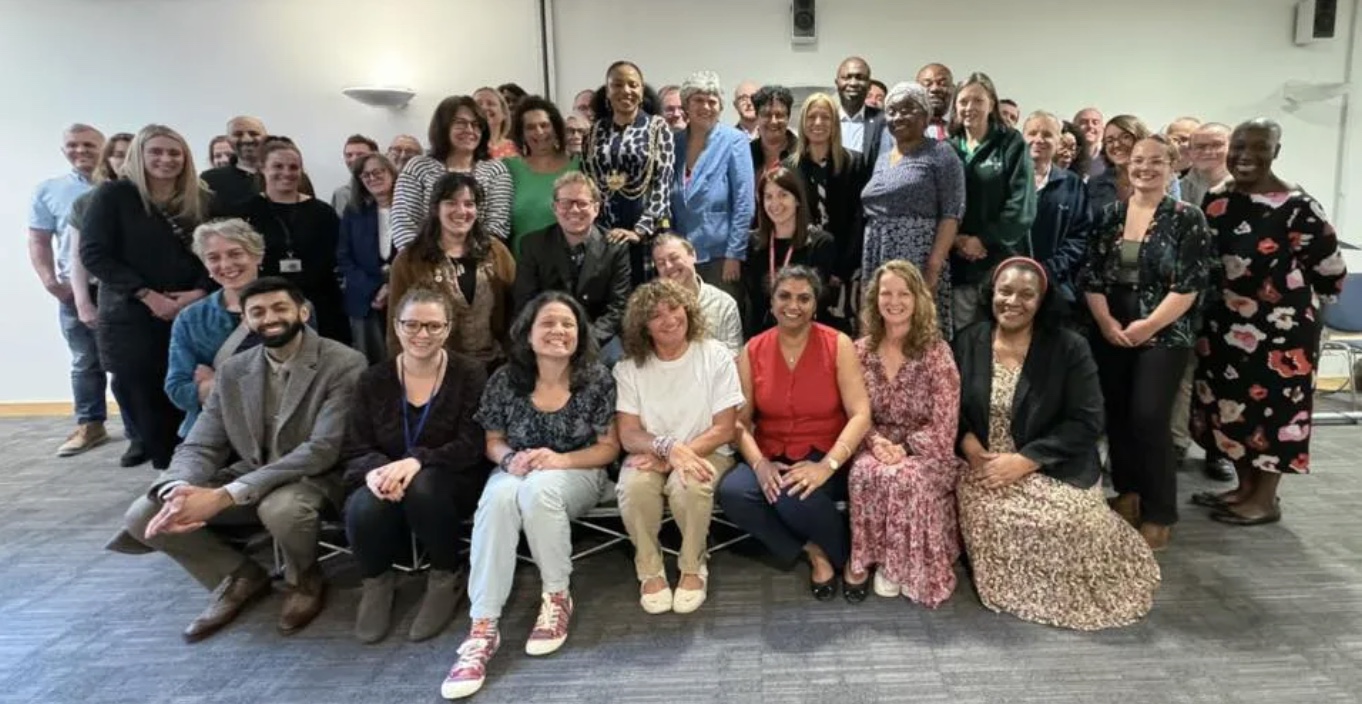 Group photo representing the Leeds Food Aid Network community